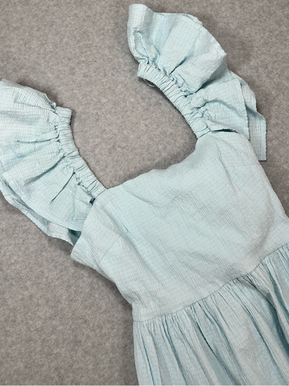 Francesca’s Mi Ami Light Blue Textured Mini Dress XS NWT Open Back Bow Pockets